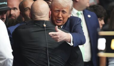 Trump receives a standing ovation as he enters a UFC event in Miami