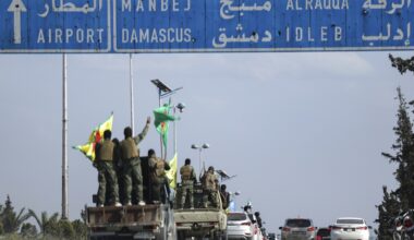 Kurdish fighters leave northern city in Syria as part of deal with central government