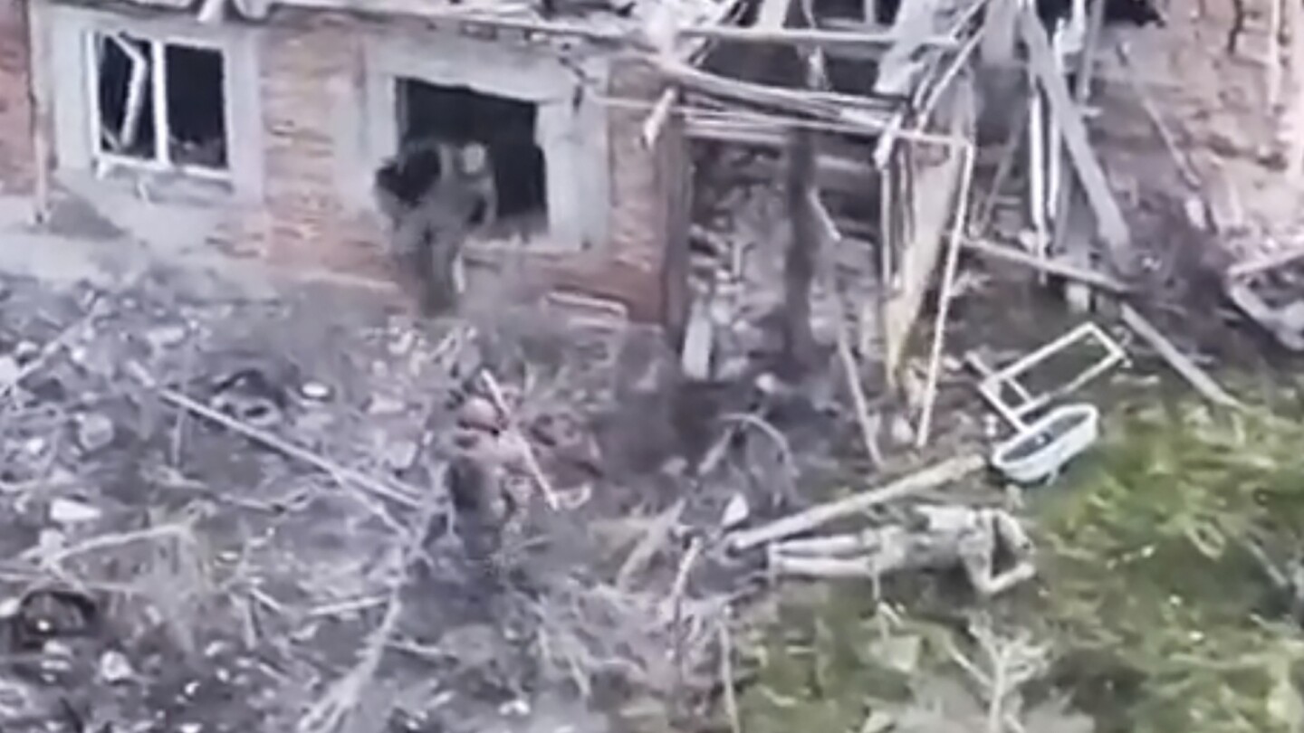 A video shows men identified as Russian troops holding Ukrainian POWs. Then the killing begins