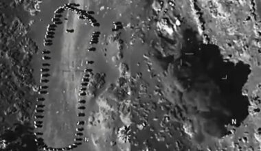 The black-and-white footage showed human figures captured from a near-vertical angle.