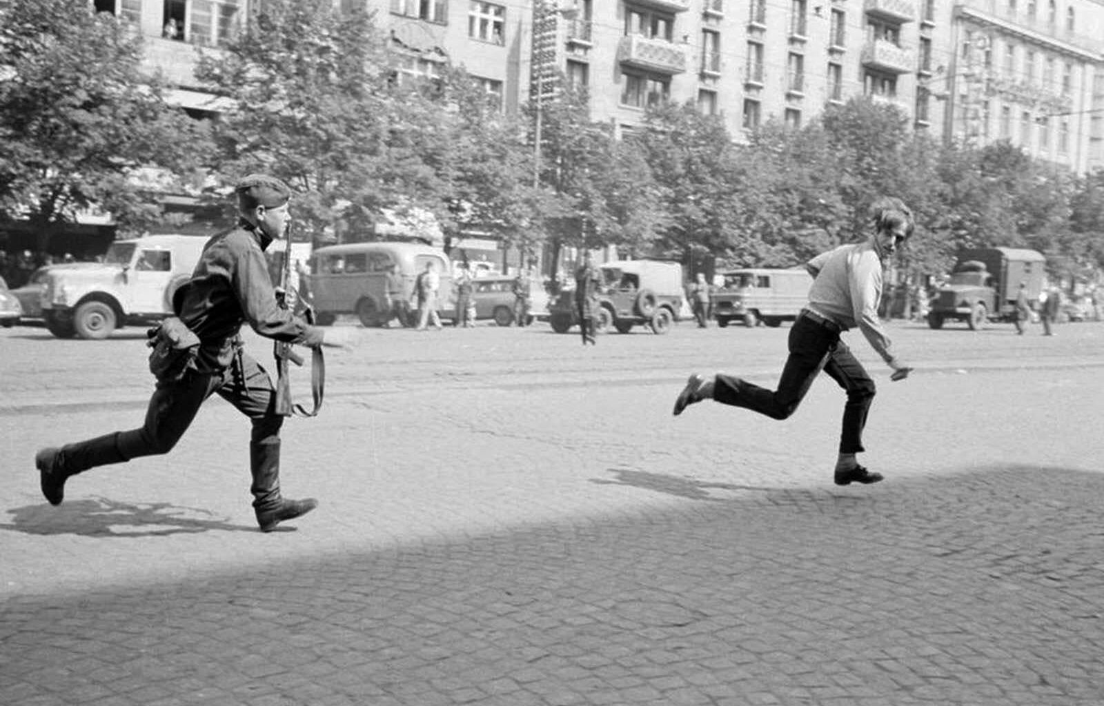The Prague Spring: Soviet soldier chasing young man who had thrown stones at a tank, 1968