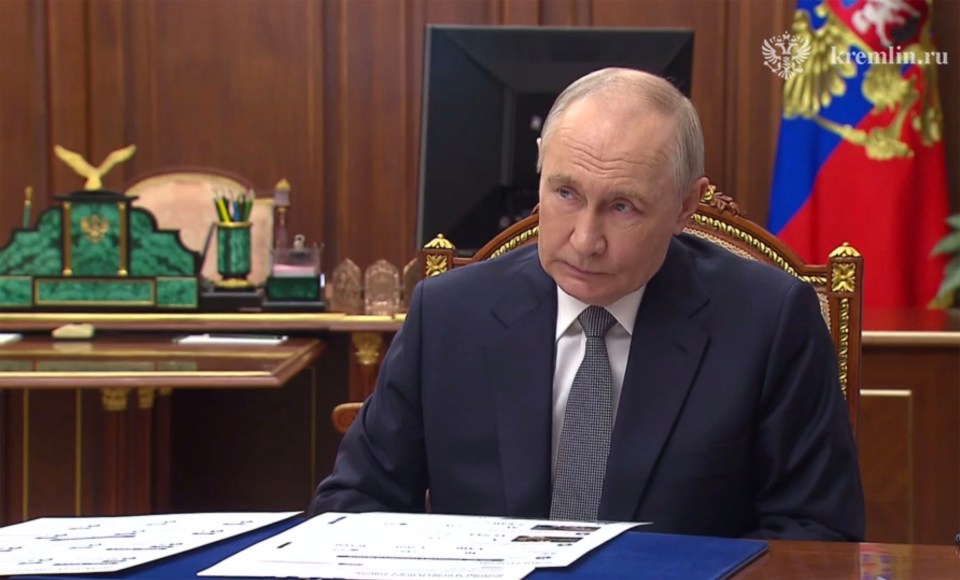 Vladimir Putin in a meeting.