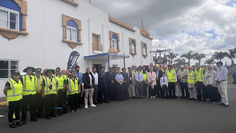 Volunteers from across South Auckland stand outside Gurdwara Sri Kalgidhar Sahib, where the launch of Takanini’s new community patrol was held.