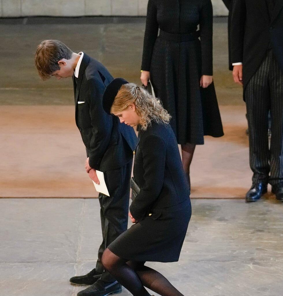Who are the people in the background of this photo?