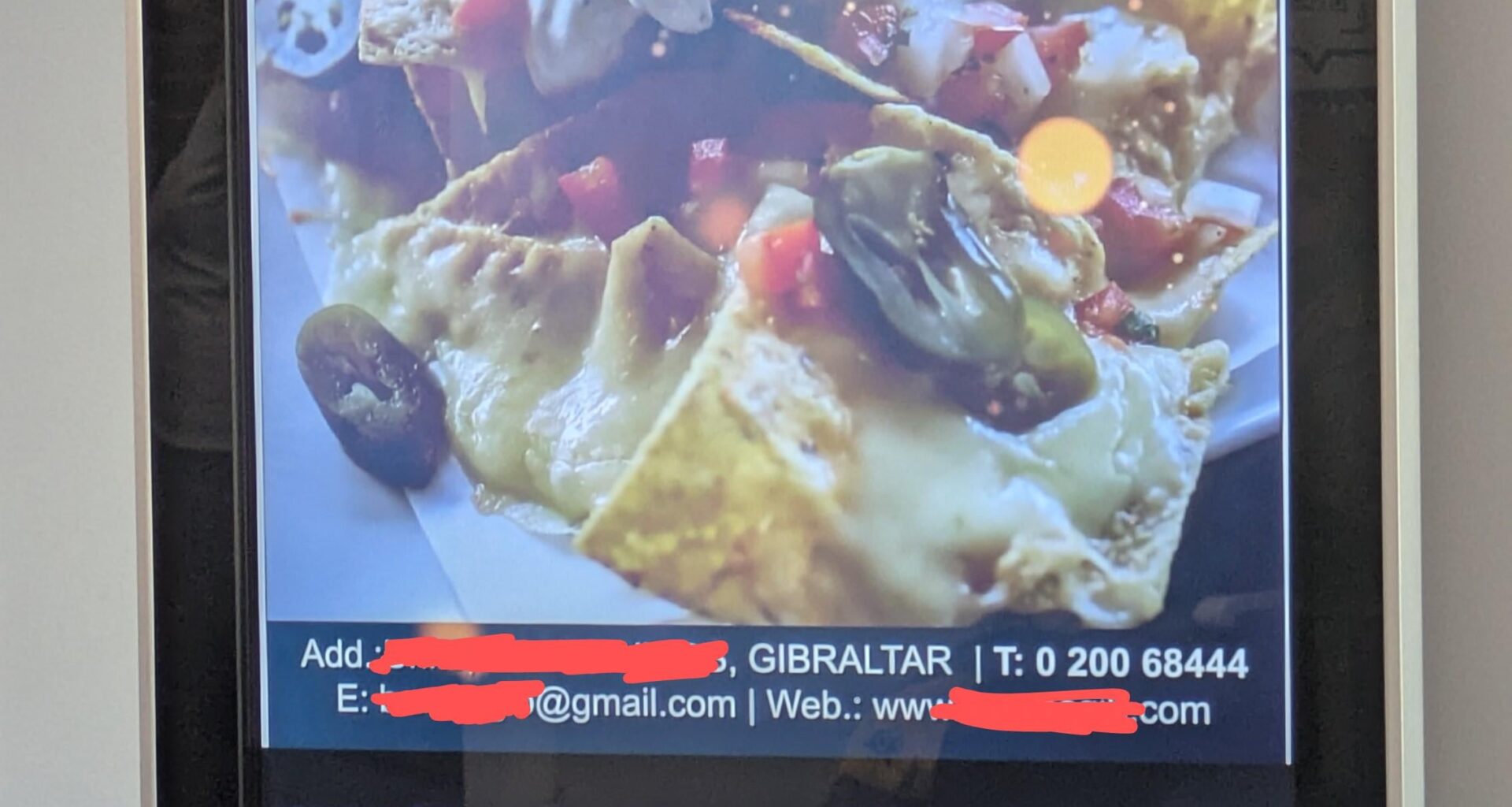 There's a totem showing ads in my GP's waiting room. And for some reason there's an ad for a restaurant in Gibraltar in it