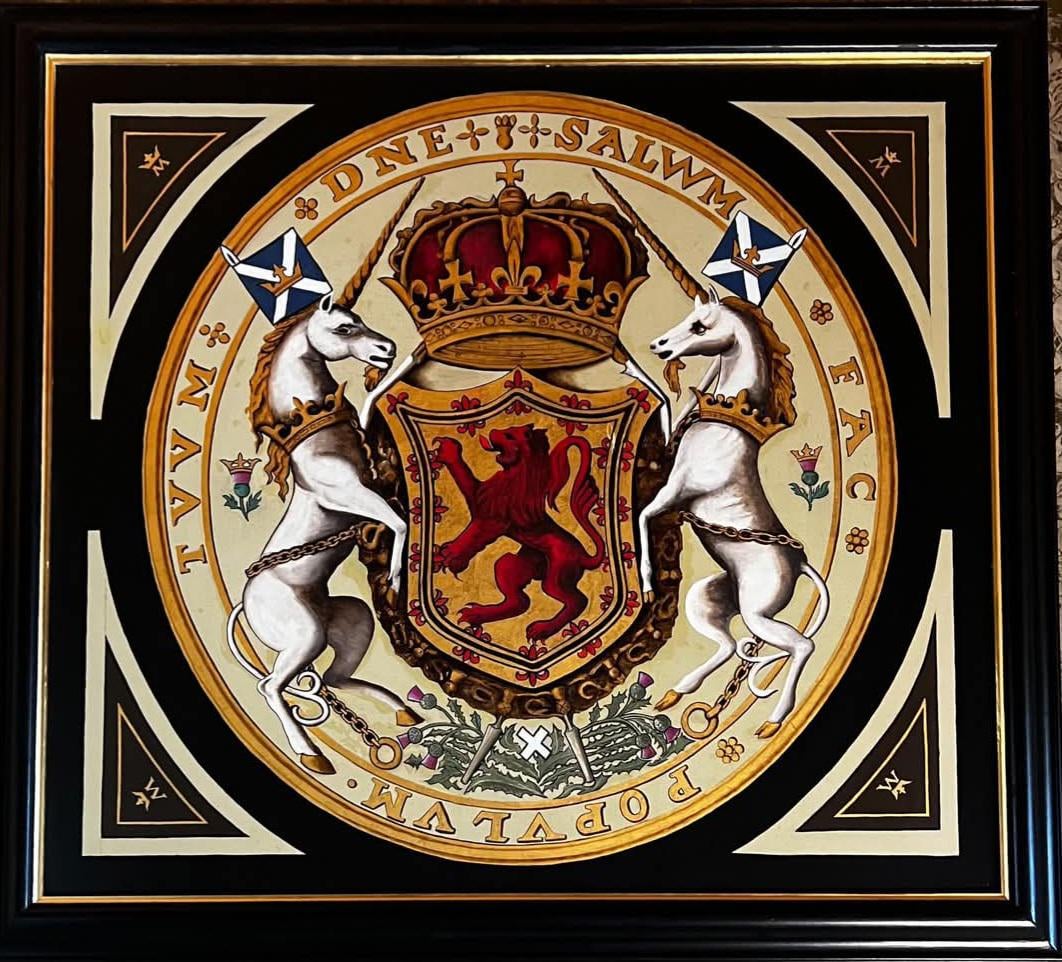 The coat of arms of Scotland as displayed above a fireplace at Falkland palace