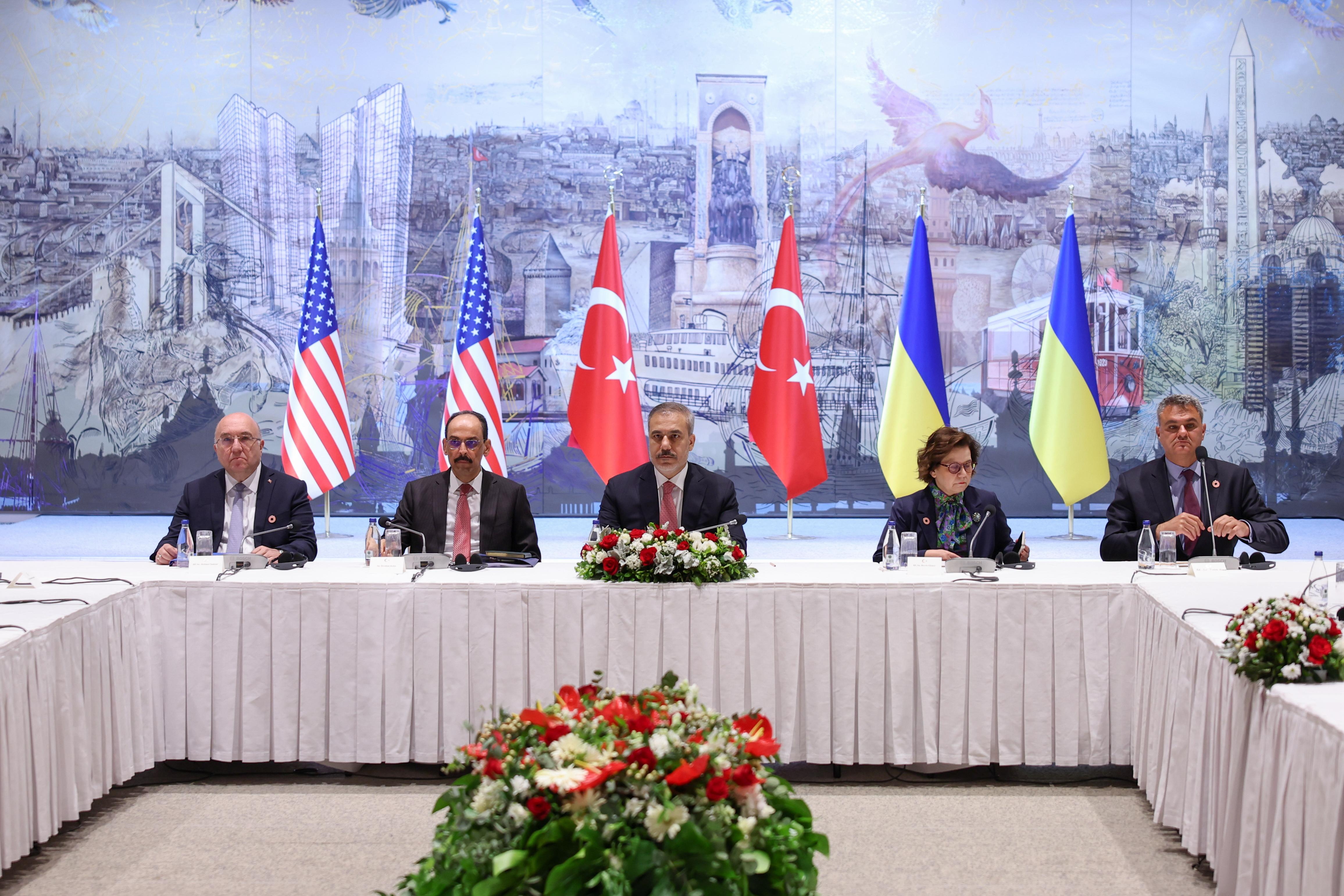 The Turkish foreign minister Hakan Fidan, centre, and Ibrahim Kalin, the director of Turkish National Intelligence Organization meeting with members of the Ukrainian delegation