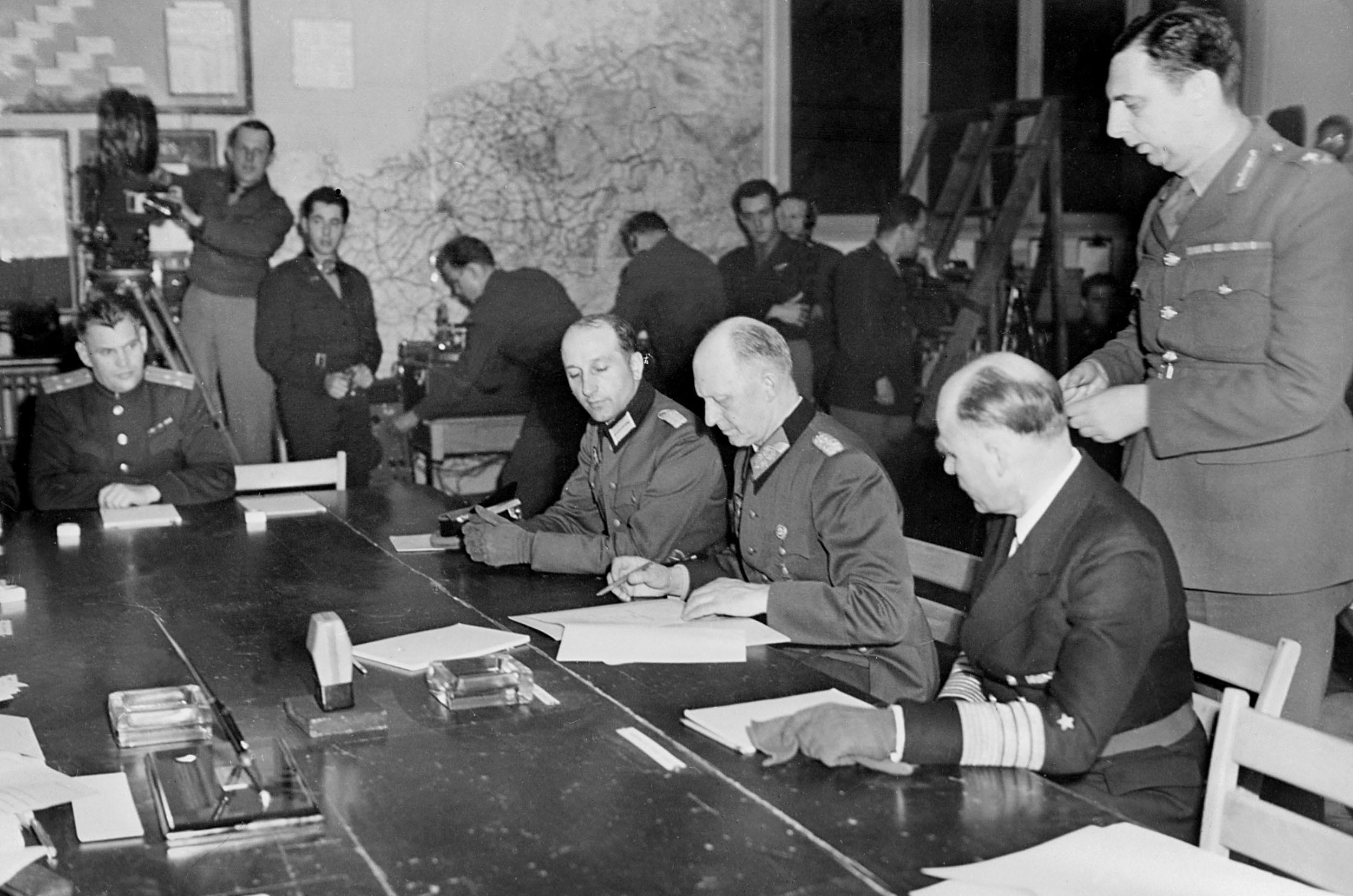 General Alfred Jodl signs Germany’s unconditional surrender at Allied headquarters in Reims