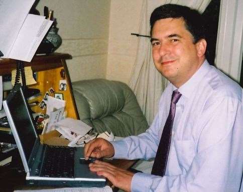 Robert in his living room office, where it all began over 25 years ago