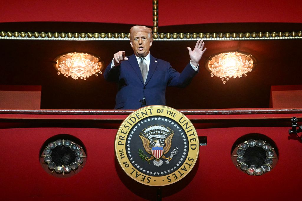US President Donald Trump stands in the presidential box as he tours the John F. Kennedy Center for the Performing Arts in Washington, DC, on March 17, 2025. Trump was appointed chairman of the Kennedy Center on February 12, 2025, as a new board of trustees loyal to the US president brought his aggressive rightwing, anti-"woke" stamp to Washington's premier arts venue