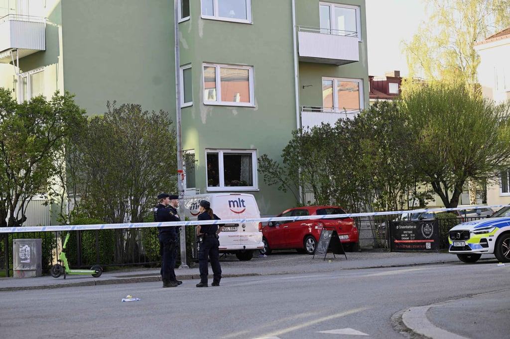 Police at the scene after the shooting in central Uppsala, Sweden on Tuesday. Three youths aged 15 to 20 were killed. Photo: via AP