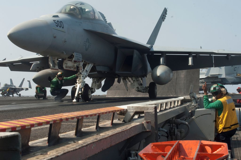 A F/A-18E Super Hornet fighter the flight deck for the USS Harry S. Truman.