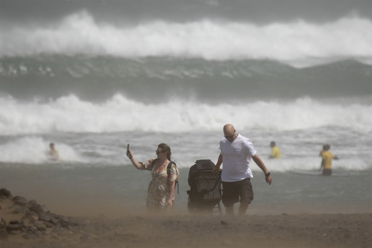Weather warnings issued in Spain over possible snow as temperatures set to soar in the UK