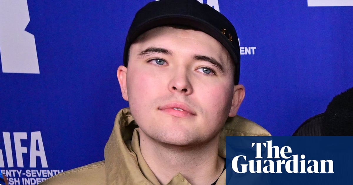 Kneecap rapper charged with terrorism offence over alleged Hezbollah flag at London gig | UK news