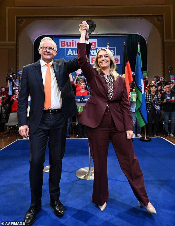 Australian Prime Minister Anthony Albanese and fiancÃ©e Jodie Haydon acknowledge supporters during a campaign rally at Parramatta town hall in the electorate of Parramatta on Day 30 of the 2025 federal election campaign, Sydney, Sunday, April 27, 2025. (AAP Image/Lukas Coch) NO ARCHIVING