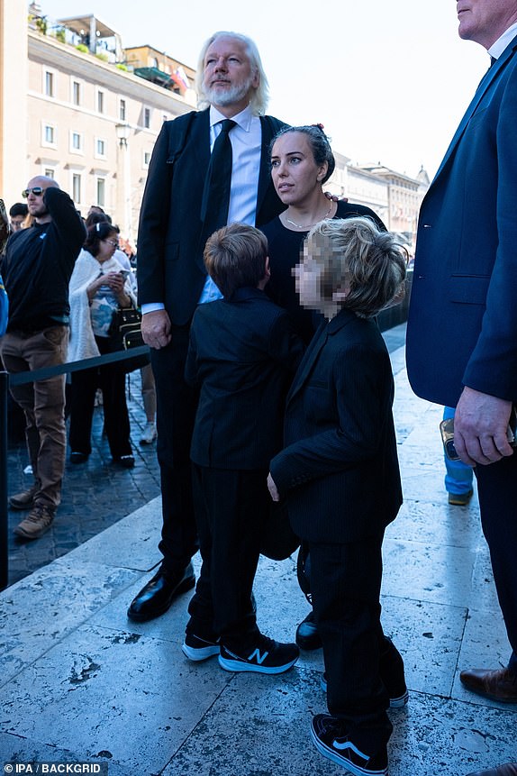 BGUK_3218640 - Rome, ITALY  - The Funeral Procession of Pope Francis passes through Piazza Venezia in Rome  Pictured: Julian Assange  BACKGRID UK 26 APRIL 2025   BYLINE MUST READ: IPA / BACKGRID  UK: +44 208 344 2007 / uksales@backgrid.com  USA: +1 310 798 9111 / usasales@backgrid.com  *Pictures Containing Children Please Pixelate Face Prior To Publication*