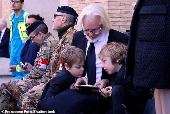 Mandatory Credit: Photo by Francesco Fotia/Shutterstock (15271314a) Julian Assange with his son during Pope Francis' funeral mass, Vatican City, 26 April 2025 Pope Francis' funeral mass, Vatican City, - 26 Apr 2025