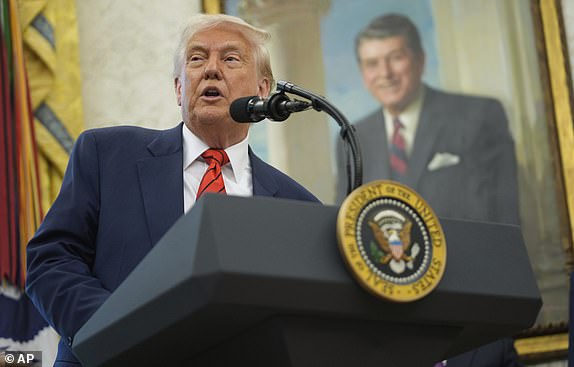 President Donald Trump speaks before Steve Witkoff is sworn as special envoy during a ceremony in the Oval Office of the White House, Tuesday, May 6, 2025, in Washington. (AP Photo/Mark Schiefelbein)
