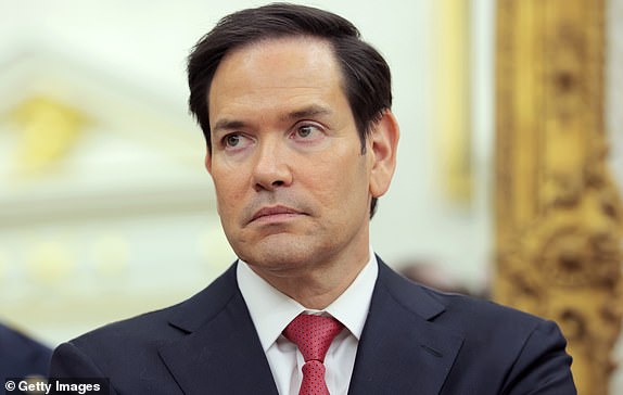 WASHINGTON, DC - MAY 06: U.S. Secretary of State Marco Rubio listens as U.S. President Donald Trump speaks during a swearing-in ceremony for Special Envoy to the Middle East Steve Witkoff in the Oval Office at the White House on May 06, 2025 in Washington, DC. U.S. President Donald Trump provided an update on the Houthi conflict in the Middle East. (Photo by Anna Moneymaker/Getty Images)