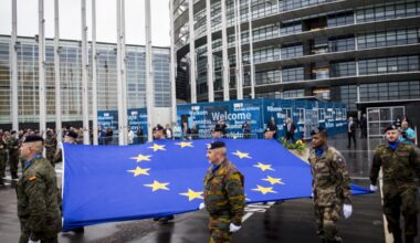 Soldiers of a Eurocorps detachment raise the European Union flag during the open day at the European Parliament in Strasbourg in May 2019.