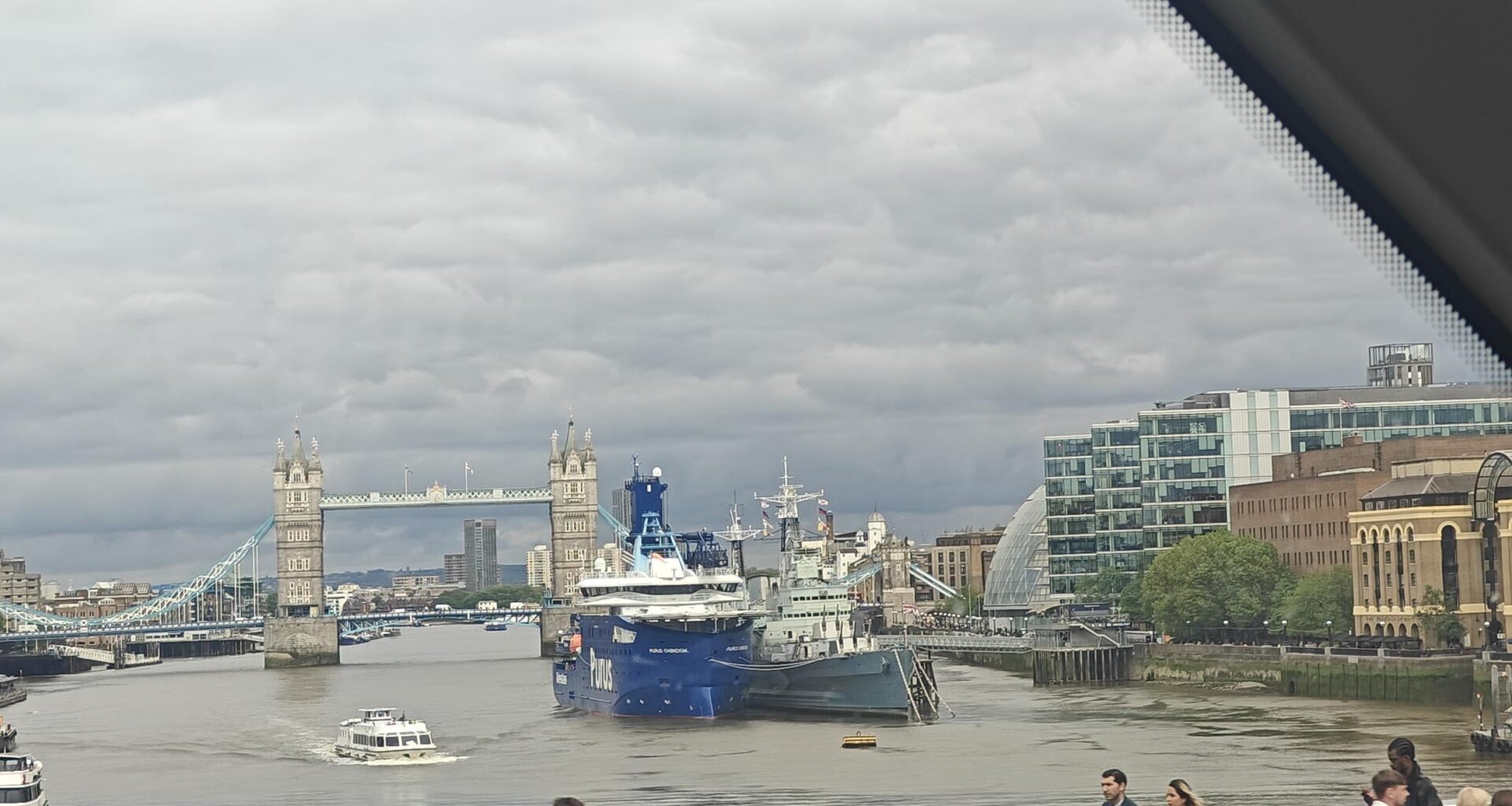 Does anyone know why there is a giant blue ship next to HMS Belfast?