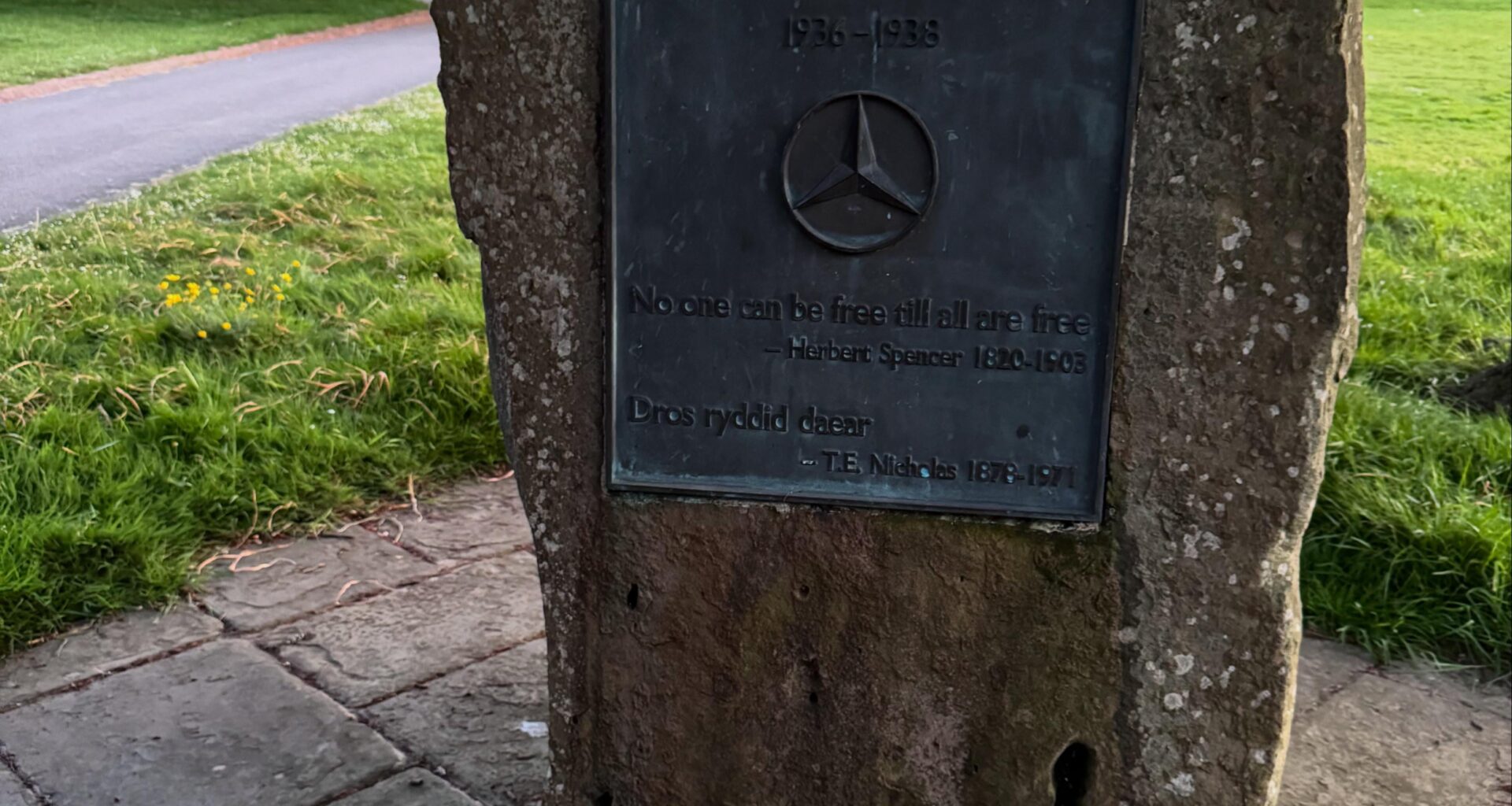Flowers laid at the memorial to the Welsh volunteers who fought fascism in Spain, in honour of V.E. Day