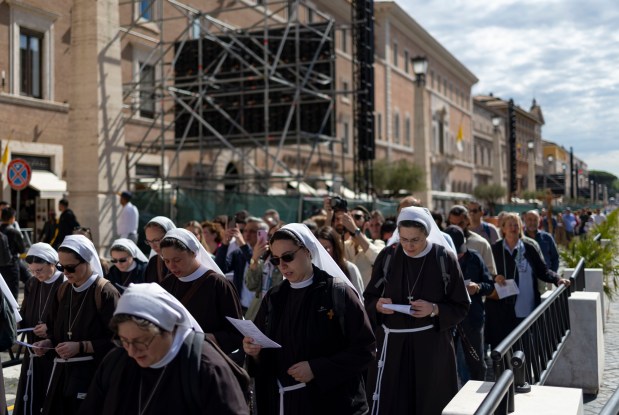 Nuns join a procession into St. Peter's Square as part of the Jubilee celebration, May 16, 2025, before the installation of Pope Leo XIV at the Vatican. (Brian Cassella/Chicago Tribune)