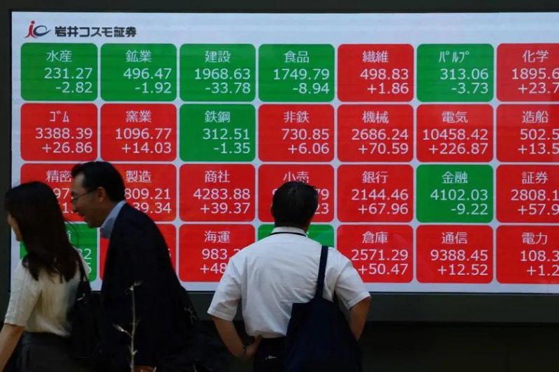 Tokyo stocks edge up over Wall Street gains