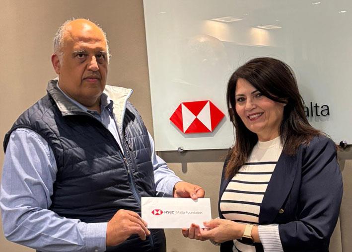 Glenn Bugeja on behalf of the HSBC Malta Foundation and Suzette Muscat, Executive Secretary at Life Network Foundation
