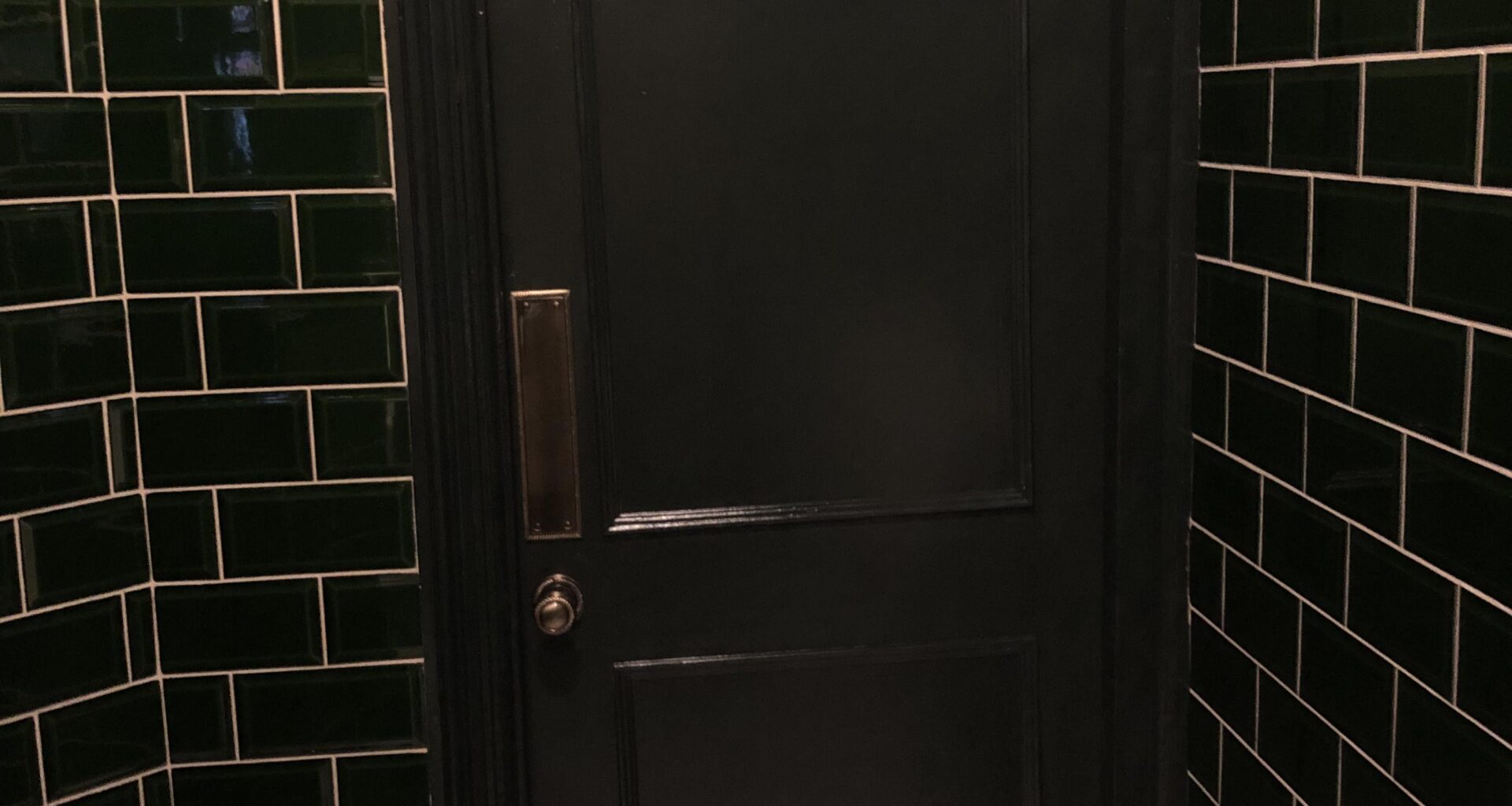 This pub toilet door has a handy gap at the top so you can tell if it’s in use or want to deliver a small to mid-sized package to whoever is in there.