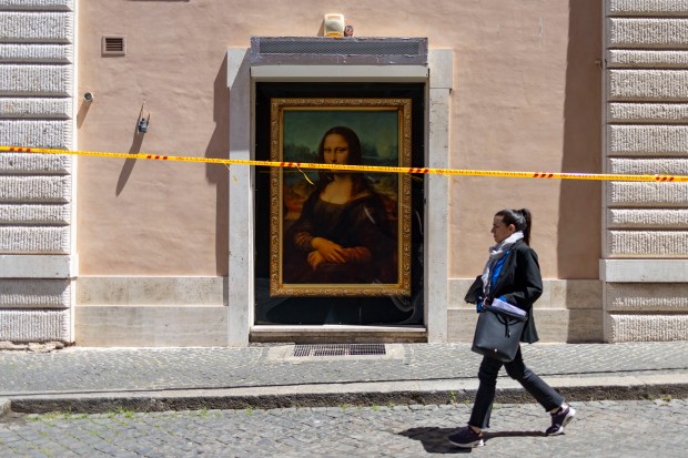 A poster shows the Mona Lisa on May 16, 2025,...