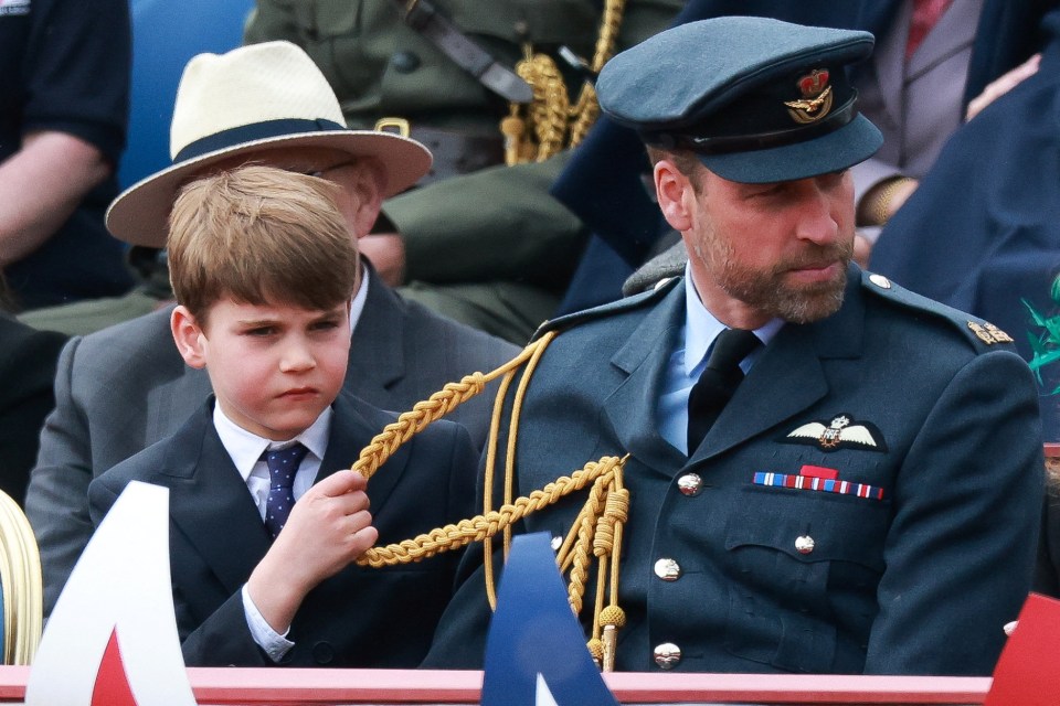 Prince William and Prince Louis at a VE Day parade.