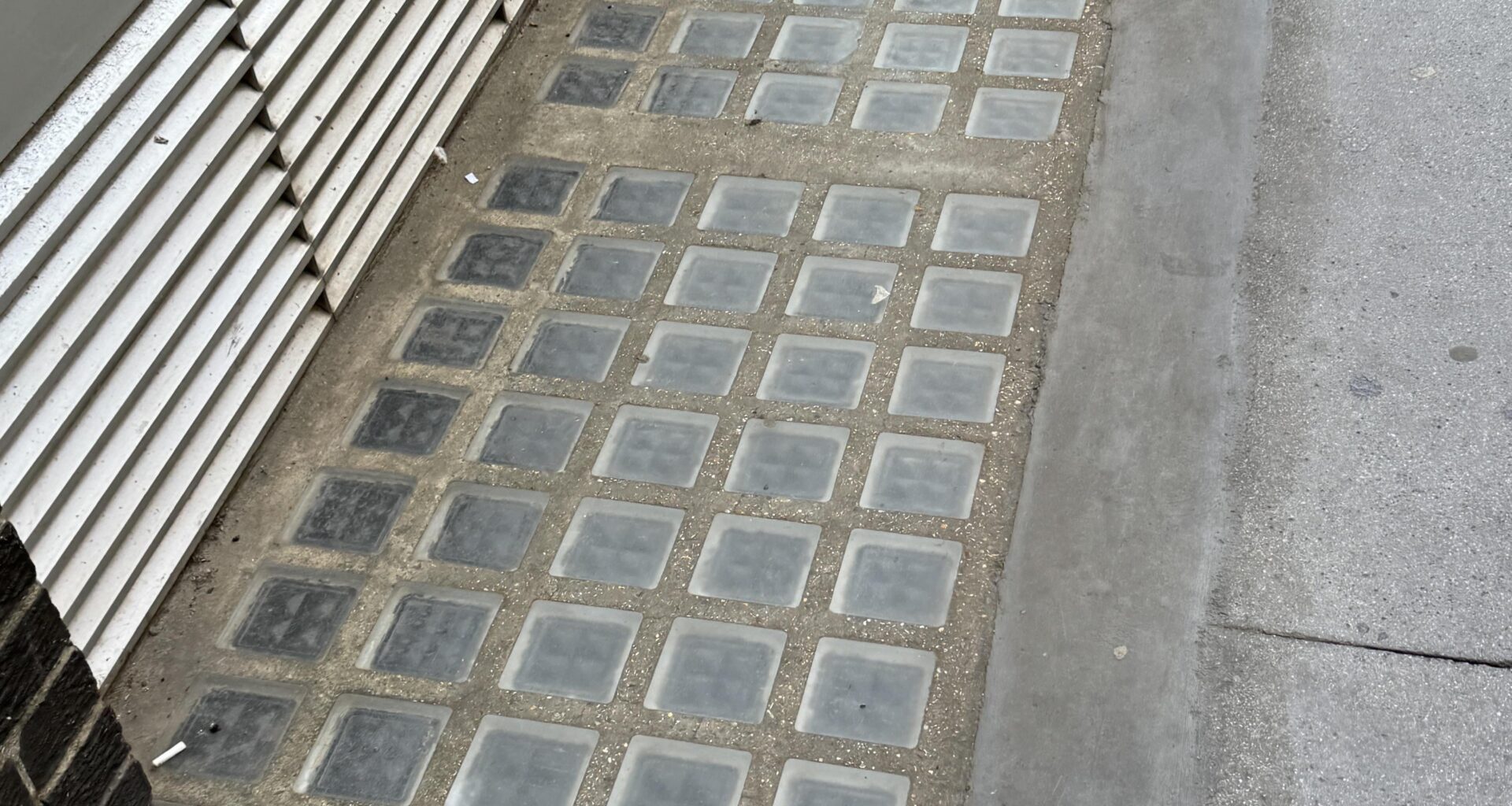 Does anyone know what these tiles I see on the ground every so often are?