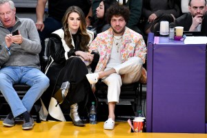 LOS ANGELES, CALIFORNIA - JANUARY 03: Selena Gomez and Benny Blanco attend a basketball game between the Los Angeles Lakers and the Miami Heat at Crypto.com Arena on January 03, 2024 in Los Angeles, California. NOTE TO USER: User expressly acknowledges and agrees that, by downloading and or using this photograph, User is consenting to the terms and conditions of the Getty Images License Agreement. (Photo by Allen Berezovsky/Getty Images)