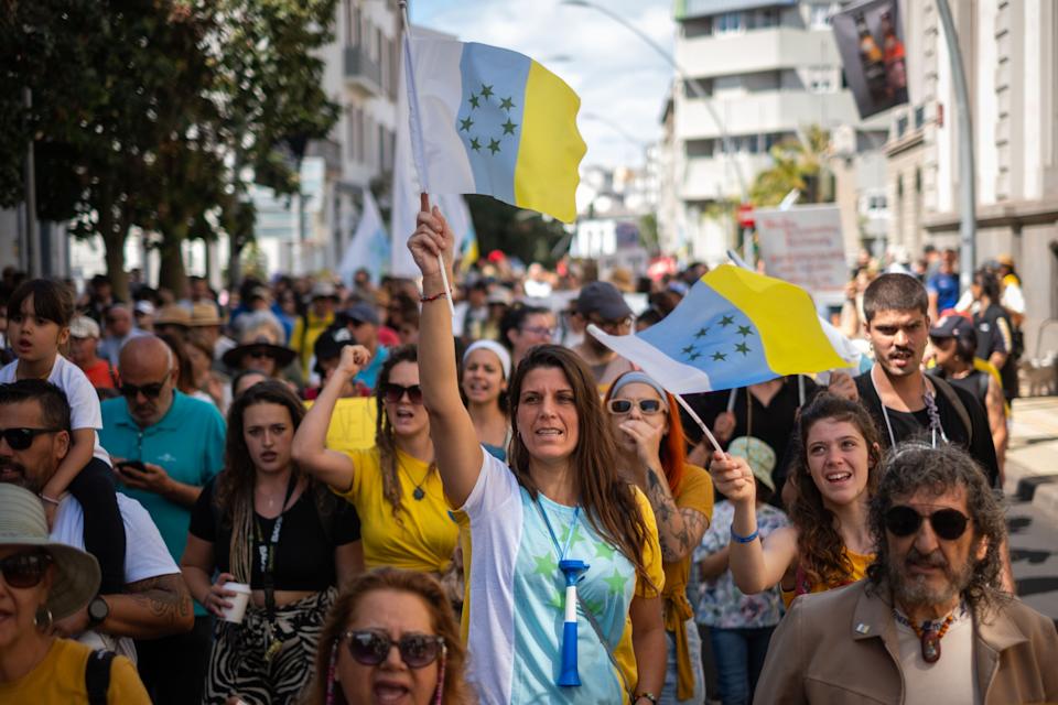 TENERIFE, SPAIN - MAY 18: Thousands of people are protesting against the tourism model and mass tourism in the Canary Islands in Tenefire, Spain on May 18, 2025. Across all the islands of the archipelago, as well as in seven cities on the Spanish mainland and in Berlin. These demonstrations aim to denounce the current tourism model, which they describe as unsustainable and harmful to the environment and the quality of life of local residents. (Photo by Andres Gutierrez/Anadolu via Getty Images)