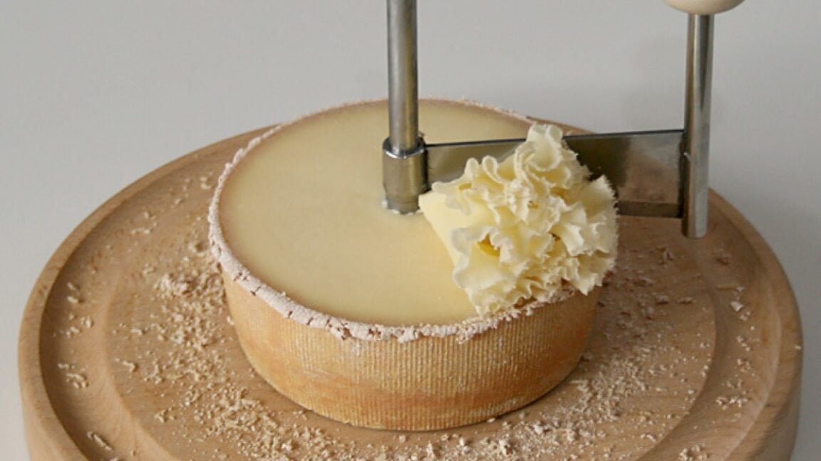 The physics of frilly Swiss cheese “flowers”