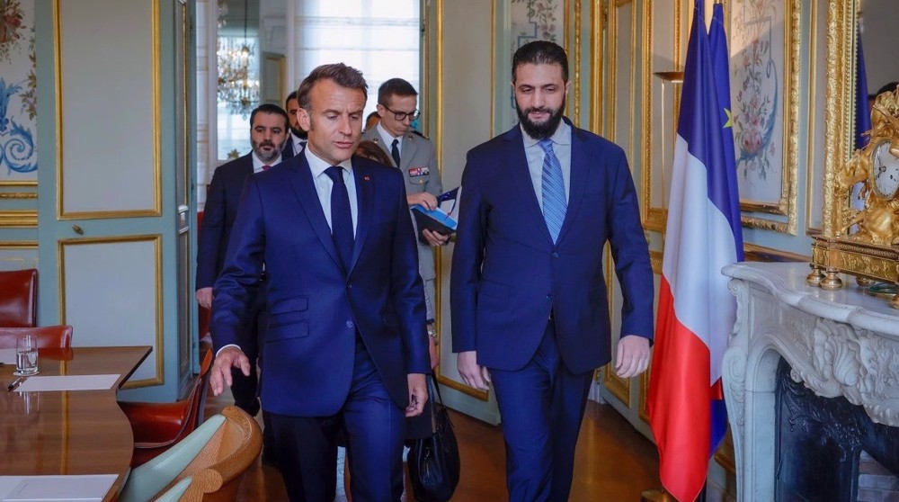Macron hosts Syrias de facto president and ex-Qaeda leader at Elysee