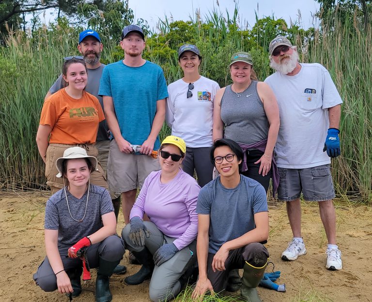 Staff from DNR’s Watershed and Climate Services assist at a CBEC planting. DNR photo