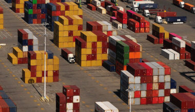 Shipping containers are stacked at the Port of Oakland in Oakland, California