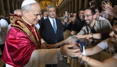 Pope Leo XIV blesses a baby during his May 20, 2025, visit to the Basilica of St. Paul Outside the Walls in Rome.