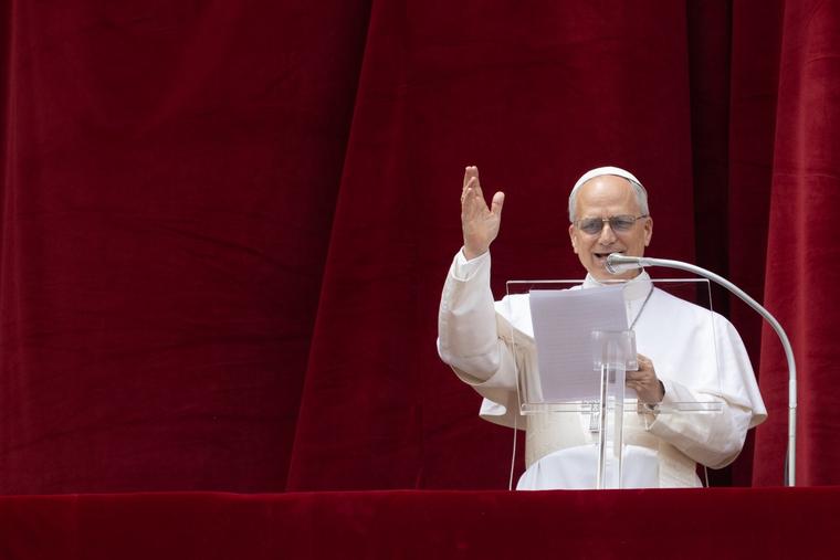 Pope Leo XIV sings the Regina Caeli from the loggia overlooking St. Peter's Square on May 11, 2025.