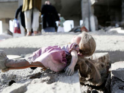 A child's doll lies in the rubble of a house after it was hit by aerial attacks by U.S.-run jetfighters on April 7, 2025, in Sana'a, Yemen.