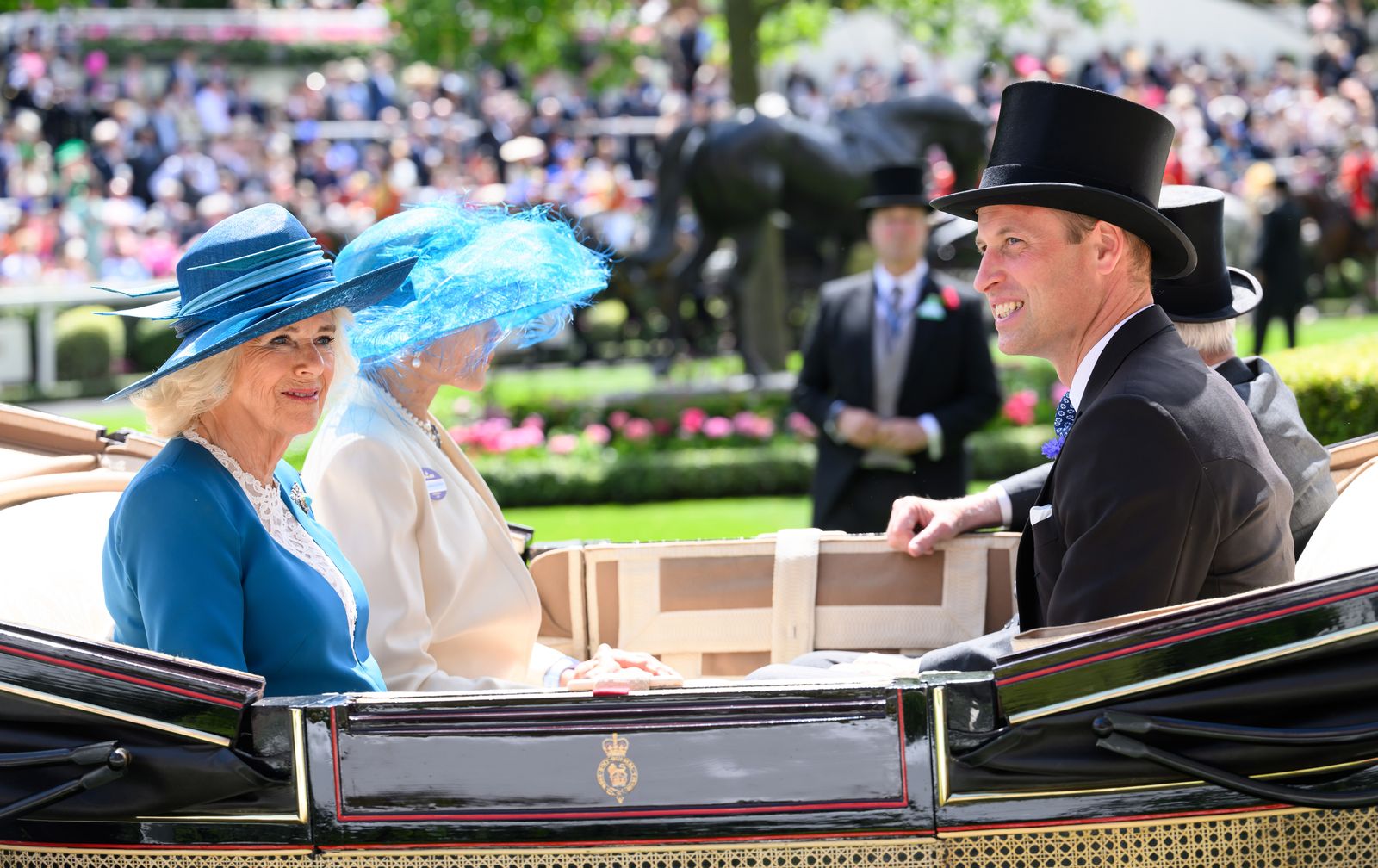 Image may contain Prince William Duke of Cambridge Person Adult Clothing Hat Accessories Formal Wear and Tie