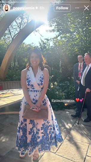 Princess Eugenie wearing a white halter dress with blue florals smiling outside