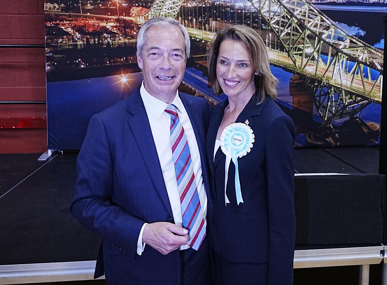 Reform UK's Sarah Pochin and party leader Nigel Farage talk to the media after the party won the seat in the Runcorn and Helsby by-election at DCBL Halton Stadium, Widnes, Cheshire. Picture date: Friday May 2, 2025. (Photo by Peter Byrne/PA Images via Getty Images)