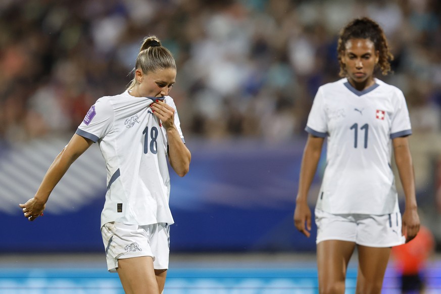 Viola Calligaris (CHE), left, and Coumba Sow (CHE) react during the UEFA Women's Nations League match France against Switzerland, in Nancy, France, Friday, May 30, 2025. (KEYSTONE/Peter Klaunzer)