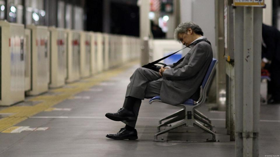 'In the past, workers were extremely loyal to their employers, worked long hours, put in unpaid overtime and did not look to switch companies'<span class="copyright">Yoshikazu Tsuno/AFP</span>