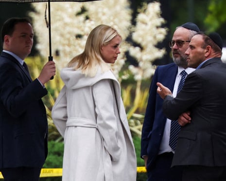 Pam Bondi speaking to two other people