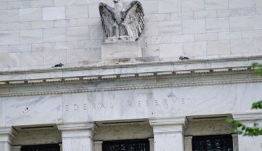 Fed officials, citing uncertainty, reiterate patient policy stance