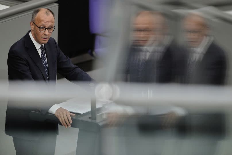 Friedrich Merz delivers his first speech as German Chancellor in the parliament in Berlin, Germany, Wednesday, May 14, 2025